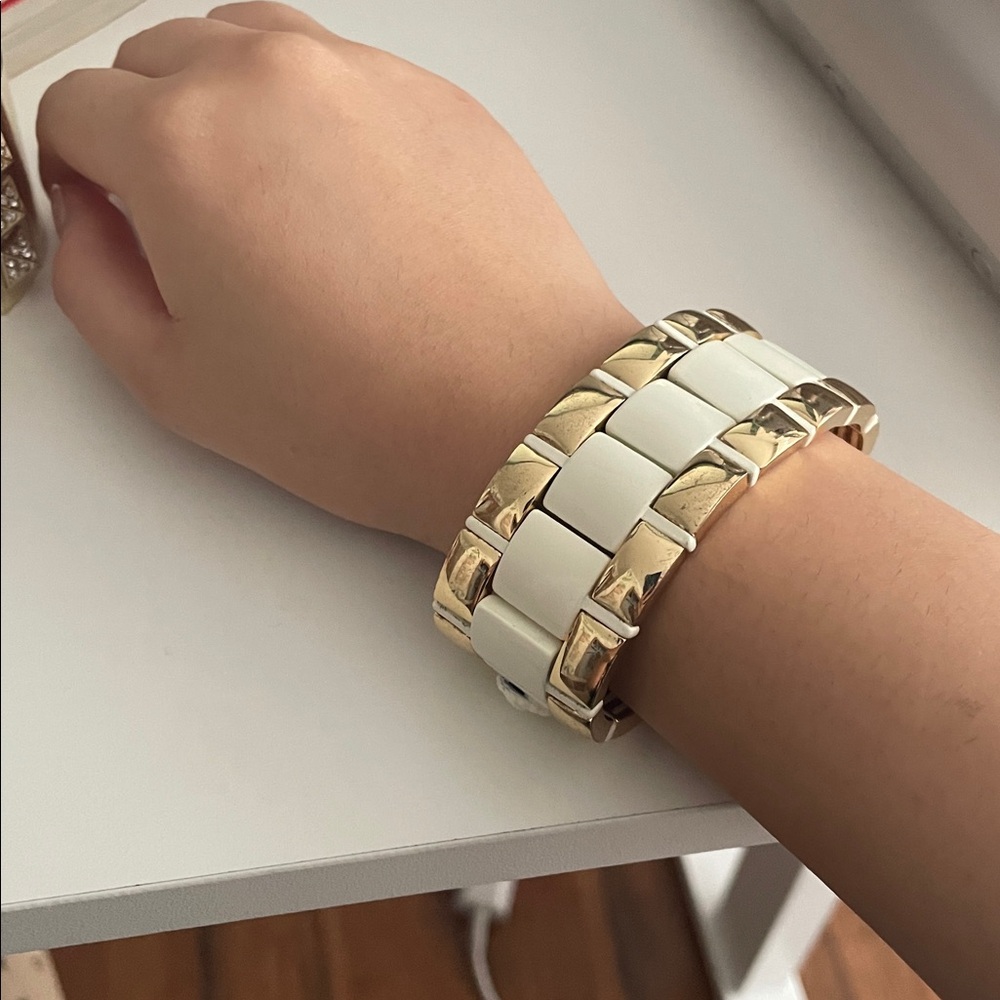 Anne Klein women's gold-tone and white resin bracelet watch